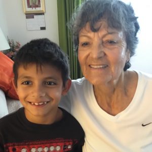 Agustin, 7 with grandma Aurora 75