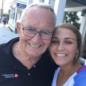 A 19-year-old college student cherishing memories in a meaningful conversation with her 84-year-old grandfather