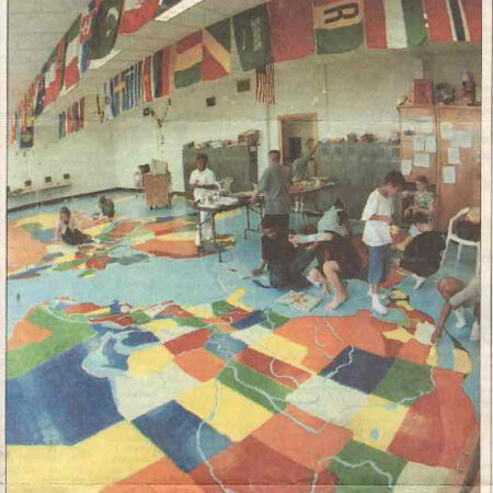 Teaching Geography using a room size map painted on the floor